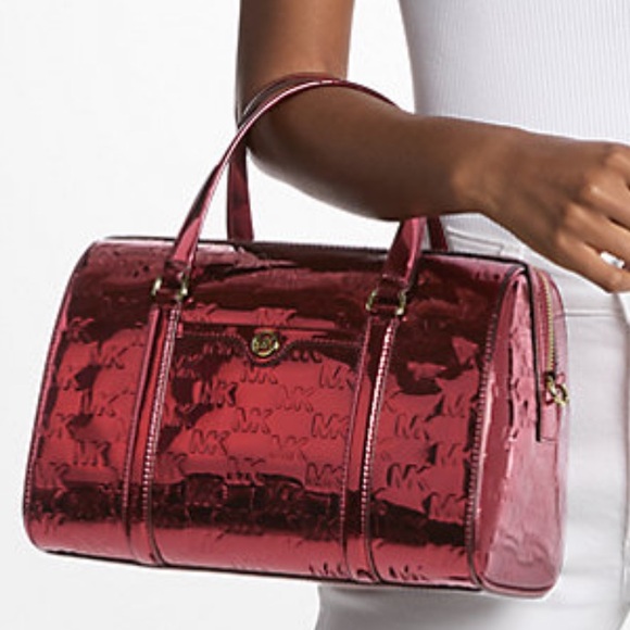 Michael Kors Handbags - MICHAEL KORS Jet Set Medium Metallic Logo Debossed Satchel Duffle Duffel
Cherry